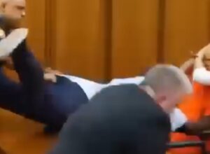 Father attacks daughter’s killer in court