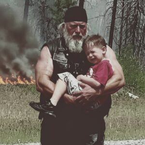 Biker Walked Through Fire Carrying Disabled Boy After Everyone Lost Hope