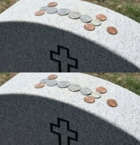 People are placing coins on military tombstones, when you learn why you’ll pull out your change